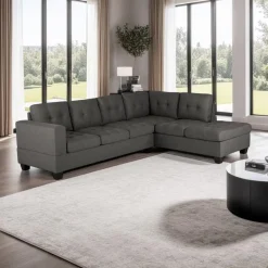 Reversible Sectional with a Drop-Down Backrest and Cup Holders
